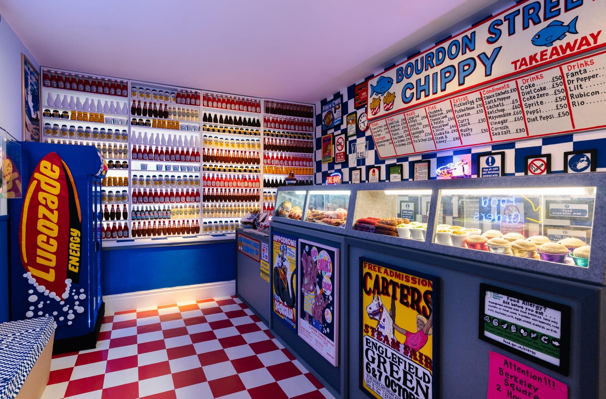 the interior of an art installation of a fish and chip shop made entirely of felt