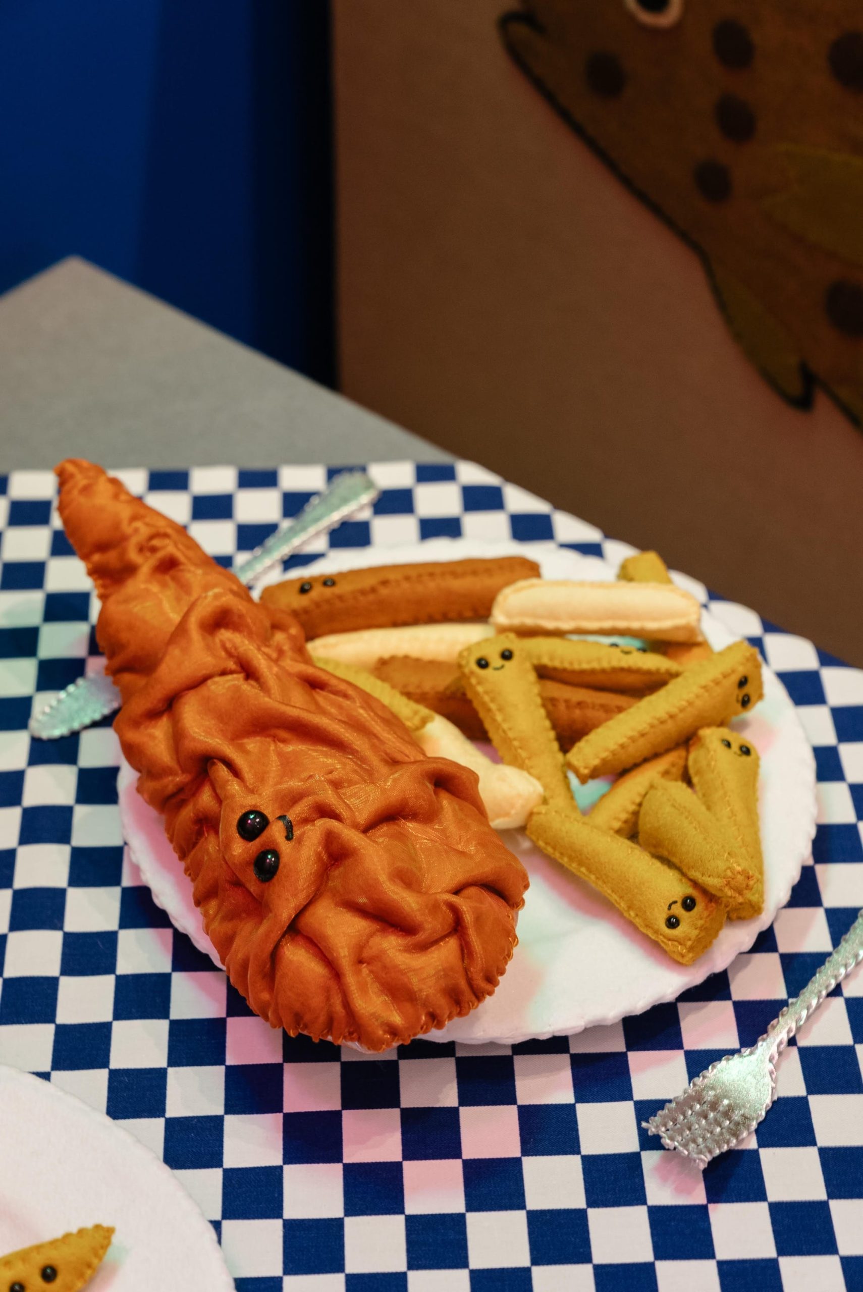 fish and chips on a plate made entirely of felt
